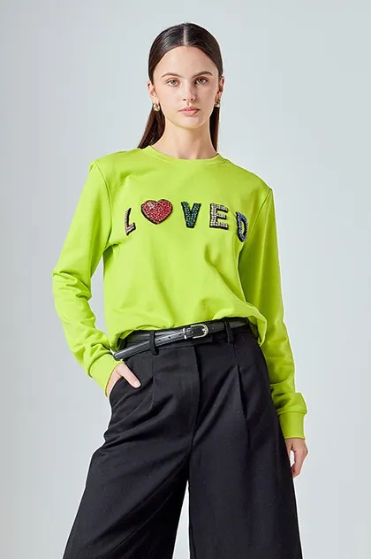Loved Embellished Sweatshirt — green sweaters & knits from Pieces of a Dream